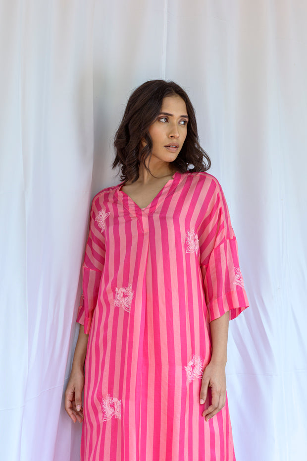 Striper tunic with allover hand embroidered motifs along with solid spaghetti lining